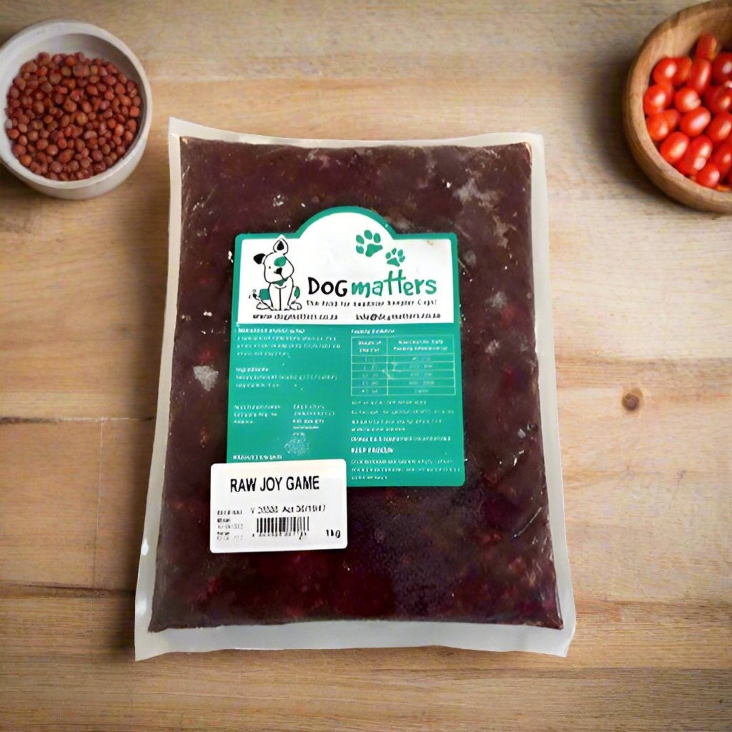 Image of Dogmatters Raw Joy Packaging: "1kg package of Dogmatters Raw Joy Game for Dogs, featuring venison and chicken, designed for a complete and balanced diet.